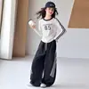 Conjunto de Dos Piezas para Niñas Primavera y Otoño 2026 Nuevo Otoño Camiseta Rayada para Niñas Pantalones Largos Casuales Pantalones de Pierna Ancha para Niños Modernos