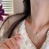 Collar de perlas naturales de agua dulce estilo francés, retro, sencillo, personalizado, chapado en cobre, con cadena de oro y colgante de nido de pájaro para mujer