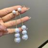 2024 nuevos aretes populares de borla de perlas de alta gama aretes simples diseño de nicho aretes de temperamento a la moda para mujeres