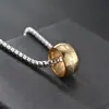 Anillo de acero de titanio europeo y americano transfronterizo nuevo de venta caliente anillo cuadrado de perla cadena de anillo colgante de anillo mágico de acero inoxidable joyería