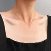Marca Moda europea y americana simple retro pequeño collar de Sol cadena de clavícula de acero de titanio chapado en oro de 18K collar joyería femenina