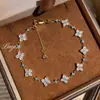 Pulsera de Trébol de Cuatro Hojas Brillante Estilo Francés Retro, Pulsera Exquisita de Moda de Alta Gama, Accesorio Dulce Versátil Femenino