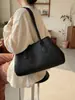 Bolsa Tote Versátil de Moda Nueva Otoño e Invierno 2026 Transfronteriza Bolso de Mano con Diseño de Nicho Casual Minimalista Bolso de Hombro para Mujer