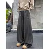 Calças masculinas de retalhos desconstruídas estilo americano, corte justo, calças casuais de perna curva, calças largas soltas da moda para o outono