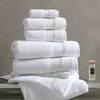 Toallas de hotel 100% algodón, acabado satinado platino, adecuadas para habitaciones de huéspedes, toallas faciales, toallas de baño, y se pueden personalizar con logotipos para su uso en B&Bs, spas y salones de belleza