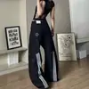 Jeans de pierna ancha con corte curvo, diseño único con patrón de estrellas y salpicaduras negras, marca nicho de moda, pantalones vaqueros lavados estilo americano con tres rayas