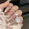 Collar para mujer con colgante bañado en plata con figura de Buda de calcedonia blanco hielo, diseños de hoja y calabaza, ágata y jade de Maitreya