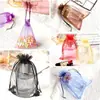 Bolsas de Organza al por Mayor en Stock con Opción de Imprimir Logo, Paquetes de Muestra para Regalo, Bolsas Transparentes de Empaque, Bolsas de Gasa Perlada de Color Sólido con Cordón