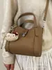 Bolso de Mano de Alta Gama para Mujer 2026 Nuevo Bolso Cruzado Versátil de Moda Super Popular Bolso Pequeño Tote Tipo Cubo