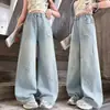 Conjunto de Roupa para Meninas Primavera e Outono 2026 Nova Moda Colete Camisa Camada com Jeans de Padrão de Estrela Único Conjunto de Três Peças