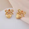 Pendientes de Acero Inoxidable Amor Simple Transfronterizos Pendientes de Lazo de Moda Versátiles para Mujer Venta al por Mayor