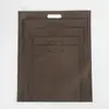 Protección ambiental pp no tejido bolsillo plano empresa corporativa publicidad no tejido bolsa de cuatro dedos no tejido bolsa perforada
