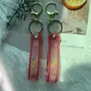 Color caramelo transparente pegamento suave pequeño fresco melocotón llavero llavero color muñeca linda botella flotante pequeños accesorios