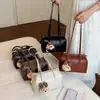 Bolso de axila coreano de nicho para mujer 2026 nuevo bolso Boston versátil tipo almohada bolso de mano de gran capacidad bolso de hombro