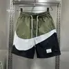 Pantalones cortos finos de seda helada para hombre, moda de verano, marca versátil, pantalones cortos casuales, pantalones cortos deportivos de secado rápido para playa