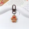 Llaveros navideños lindos, regalos navideños personalizados para niños, adornos colgantes, artículos decorativos transfronterizos, venta al por mayor de un fabricante de joyería de comercio exterior