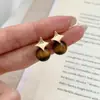 Pendientes de Plata 925 con Cierre de Mariposa Estilo Yadan Retro Lujo Ligero Temperamento Ojo de Tigre Maillard Estrella de Cuatro Puntas Dulces Frescos Versátiles