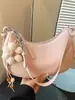 Bolso de hombro cruzado para mujer 2026, nuevo modelo tipo bolsa de dumplings, nicho, gran capacidad, para el día a día, retro