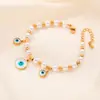 Pulseira de Aço Titânio Dourado Incrustada com Turquesa Pulseira Borboleta Cubana de Aço Inoxidável Joias Simples da Moda Europeia e Americana Atacado