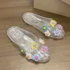 Zapatos de Gel Decorativos de Flor Dopamina Nuevos para Mujer 2026 Verano Versión Coreana Transparentes Dulces Planos de Moda Sandalias de Cristal