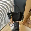 Bolso de hombro casual de nicho simple y elegante transfronterizo, nuevo bolso de mano popular estilo coreano otoño 2026, bolso de moda