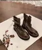 Botas de motociclista para mujer 2026, nuevo estilo, hebilla de cinturón de cuero, suela gruesa y tacón grueso, botines adelgazantes, diseño de cuero lavado estilo británico