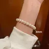 Pulsera de Perlas Blancas Lechosas Redondas Shijia Luz Fuerte Pulsera Elástica para Mujeres Pulsera Apilable No Irrita la Piel y No se Descolora Accesorios para la Mano