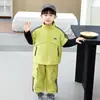 Conjunto para Niños 2026 Nueva Colección de Primavera Ropa Infantil Conjunto de Principios de Primavera para Niños Dos Piezas Falso Dos Piezas Chaqueta para Niños Moderna