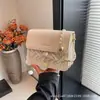 Nuevo bolso pequeño cuadrado 2026, bolso popular para mujer con diseño único, bolso de cadena, bolso de hombro y cruzado moderno y versátil