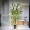 Venta al por mayor de fábrica estilo nórdico ins planta verde artificial en maceta accesorios para el hogar adornos de suelo reloj de pared colgante artificial japonés