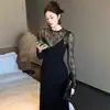 Vestido Largo de Encaje Hueco + Vestido CamisolaSet de dos piezas de vestido negro de estilo francés de alta gama para primavera y otoño