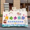 Actividades de Ventas en el Campus Mantel para Mesa de Puesto de Mercadillo Disposición de Puesto de Venta Benéfica para Jardín de Infancia Niños Metabo