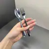 Fabricante Fuente Transfronteriza Juego de Cubiertos de Acero Inoxidable 410 con Mango Curvo para Cuchara y Tenedor para Cocina Occidental, Adecuado para Uso Doméstico y Comercial, Grandes Cantidades Disponibles para Envío Inmediato