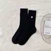 Calcetines sin costuras para mujer de primavera y verano, estilo japonés, color liso, bordado de corazón, borde con volantes, estilo universitario, algodón puro, calcetines de media pantorrilla