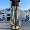 Jeans de trabajo estilo americano con patchwork y dobladillo curvo para hombre, pantalones largos de marca moderna de corte limpio, pantalones casuales de pierna ancha de ajuste holgado
