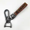 Chaveiro de Liga de Zinco de Alta Qualidade com Design Criativo Vintage, Logo Embutido Personalizado, Emblema de Carro, Pingente de Chaveiro de Carro de Couro Atacado