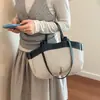 Nova coleção Primavera/Verão 2026: bolsa de ombro, bolsa transversal e bolsa tote versátil de grande capacidade, elegante e moderna, com design minimalista e sofisticado