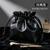 Nuevo neceser de maquillaje tipo arena movediza estilo chino, gran capacidad, bolsa de aseo de alta gama, bolsa de maquillaje impermeable de mano
