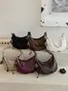 Bolsa estilosa de nicho Shuai Mi Jia para mulheres, novo modelo de verão 2026, bolsa simples tipo bolinho de ombro, bolsa de ombro e transversal