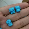 Minério associado magnesita injeção sintética turquesa de segunda geração contas espaçadoras azul-esverdeado contas esculpidas em meandro acessórios de chaveiro de casca de tartaruga