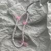 Cordón para teléfono móvil con lazo de perlas de lujo, estilo coreano, hecho a mano, con cuentas que combinan con todo, adornos colgantes para bolso, corazón colorido para niña