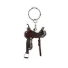 Llavero acrílico de silla de montar transfronterizo nuevo Colgante de llavero de silla de montar de vaquero occidental Colgante