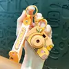 Llavero de dibujos animados creativos kappi bala de cara giratoria lindo colgante para mochila escolar llavero para llaves de coche pequeño regalo al por mayor