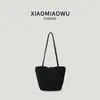 Bolso de cubo tejido de gamuza retro para mujer, versátil para el uso diario, moderno y casual, diseño nuevo, único y elegante