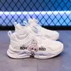 Zapatillas infantiles 2025 otoño nuevo botón giratorio zapatos blancos cómodos versátiles estudiante casual zapatillas para correr