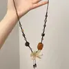 Nuevo collar tejido de flores estilo chino para mujer, diseño único con un toque nacional, cadena para la clavícula tipo gargantilla, accesorio largo vintage