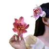 Feliz Holiday~Pasador de Flor Artificial para el Cabello para Mujer 2026 Estilo Bohemio Impresionante Clip Lateral de Gama Alta Accesorio para el Cabello al por Mayor