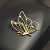 Popular Broche de Mariposa Hueca de Metal para Comercio Exterior Broche de Alta Gama Femenino para Cárdigan Chaqueta Accesorio Exquisito