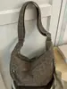 Bolso casual de gran capacidad con estampado de leopardo, bolso cruzado retro estilo Hong Kong ins, bolso de axila de nicho, bolso tipo bollo de alta moda de tendencia