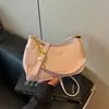 Moda Estilo Coreano Versátil para el Día a Día Bolso de Axila Tejido de Nicho 2026 Nuevo Bolso de Hombro Único Cruzado de Gama Alta